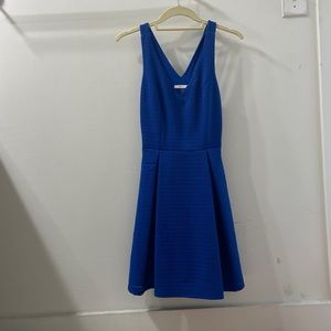 Blue a-line dress with cut outs in back